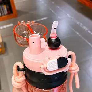 Grande bottiglia d'acqua in plastica con cannuccia e tappo a doppio uso per studenti.