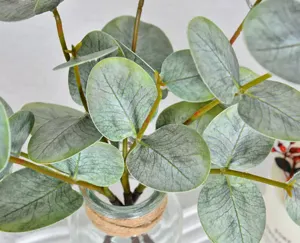 Artificial 3D eucalyptus leaves detail view, real-touch green plants for modern luxury home decor.