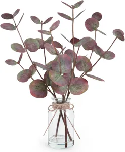 Artificial eucalyptus leaves in glass jar for modern home decor, elegant floral arrangement.