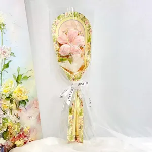 Handmade pipe cleaner hibiscus flower bouquet in transparent bag with greeting card.