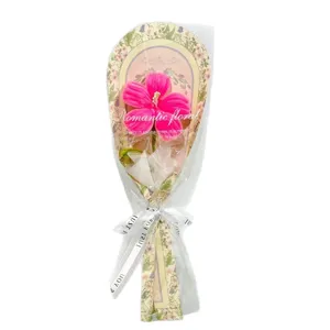 Handmade pipe cleaner pink hibiscus flower bouquet gift wrapped main product view.