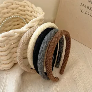 Set of knit padded headbands in neutral colors for autumn and winter high cranial top style