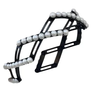 Foldable black headband with elegant white pearl accents for travel and daily wear