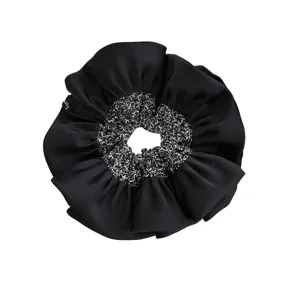 Elegant French oversized black satin scrunchie with vintage floral pattern and ruffle edges.
