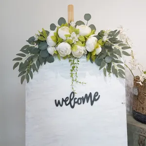 Detailed view of artificial peony flower swag and wall hanging decor for home and wedding.