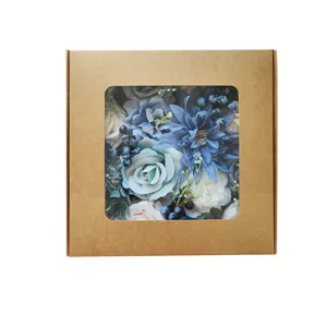 Coffret cadeau de fleurs artificielles en soie bleue, parfait pour mariages d'été.