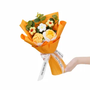 Handmade crochet flower bouquet gift with yellow wrapping paper for special occasions.