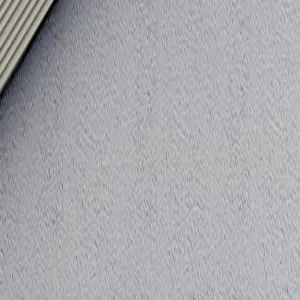 Close-up detail shot of grey daily planner notebook cover texture with vertical stripes.