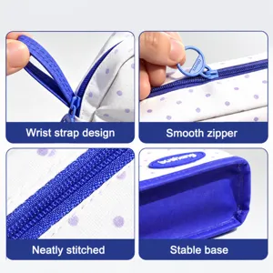Cute purple polka dot pencil pouch with carry handle smooth zipper and sturdy standable base.