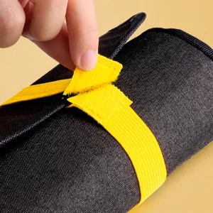 Roll-up canvas pencil case holder for art sketch drawing, portable storage bag with secure strap.