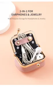 Compact pink kiss-lock storage pouch for earphones and jewelry with polka dot lining.