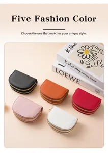 Detailed view of multi-color double zipper coin purse and card holder with stylish pebbled design.