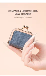 Mini leather kiss-lock coin purse in grey with rose gold frame, compact and portable detail.