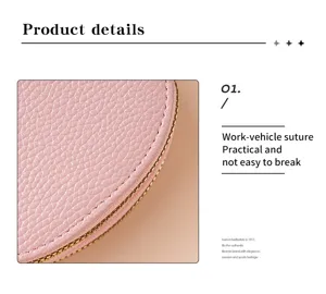 Pink leather card holder zipper pouch detail view with fine texture and metal zipper