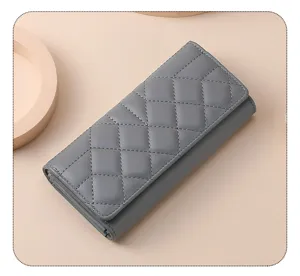 Classic women's long quilted wallet, elegant tri-fold PU leather purse with large capacity.