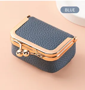Mini blue leather kiss lock jewelry box, cute metal frame case for rings and small earrings.