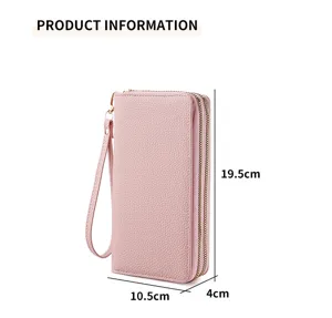 Detail view of women solid color double zipper wallet with wrist strap and card slots.