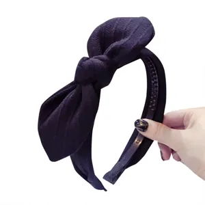 Black textured fabric rabbit ear bow headband with non-slip inner teeth for women