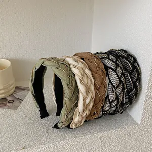 Detail of braided headbands with rhinestone chain trim in several elegant colors