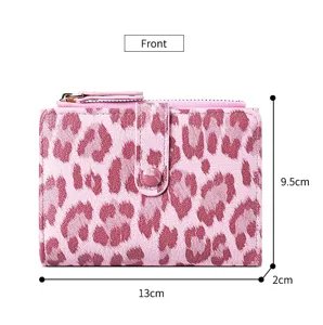 Pink leopard print short wallet for women with card slots and zipper coin pocket design.