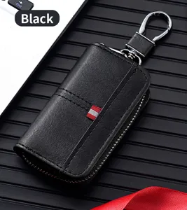 Astuccio per chiavi auto in pelle nera con chiusura lampo e dettaglio a strisce rosse.