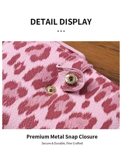 Pink leopard print short wallet detail, premium leather texture with gold metal snap.