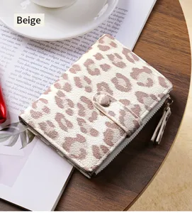 Beige leopard print short wallet for women with multiple card slots and zipper pocket.