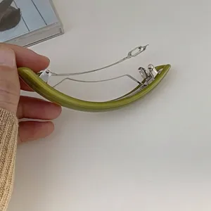 Elegant green crescent shaped spring hair clip for women's half-up low ponytail styles