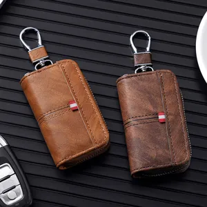 Astuccio per chiavi auto in pelle unisex con gancio in metallo e chiusura lampo, morbido.
