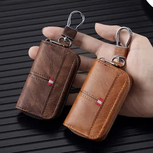Astuccio per chiavi auto in pelle di alta qualità con gancio in metallo e zip sicura.