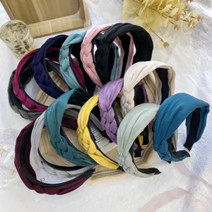Handmade braided wide fabric headband with twist knot design in various pastel colors