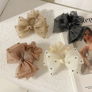 Lot de quatre chouchous nœuds en organza strassés aux couleurs douces et élégantes