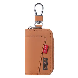 Étui à clés minimaliste en cuir marron pour homme avec crochet en métal et poche zippée