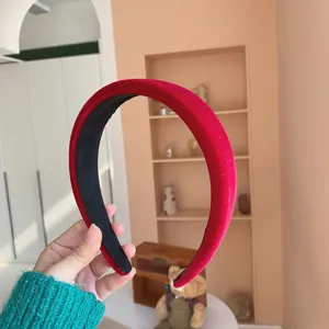 Detailed view of the soft red velvet padded headband for a festive Christmas look