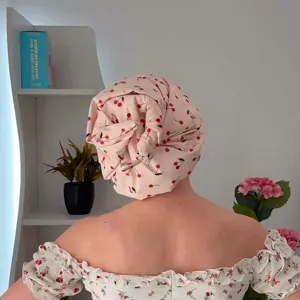 Waterproof pink shower cap with cute cherry print pattern for hair care and bathing