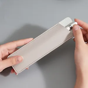 Grey leather pen sleeve for stylus and ballpoint pen, minimalist business stationery case.