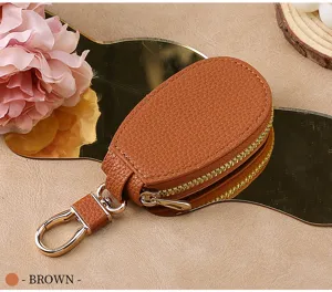 Brown PU leather car key case with zipper and metal hook ring for daily portable storage.