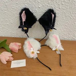Close-up of plush cat ear headbands with bows and bells for cosplay and Halloween