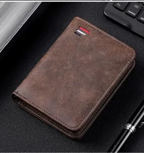 Detailed closeup of vintage brown men wallet with multiple card slots and sleek stitch.