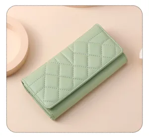 Light green quilted long wallet for women, stylish tri-fold leather clutch purse with large capacity.