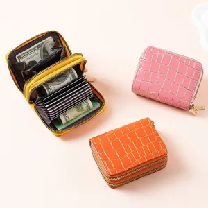 Portafoglio donna motivo pietra multi-carte con doppia cerniera e porta carte compatto.