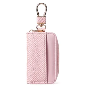 Rosa Leder Autoschluessel Etui mit Metall Schluesselanhaenger und Reissverschluss.