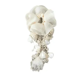 Elegant white bohemian tassel hair scrunchie with organza flower and lace details