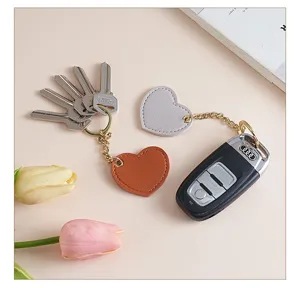 Leather heart keychain cute bag pendant car key accessory with multi-keys setup.