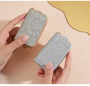 Astuccio per chiavi auto in pelle glitterata con cerniera e anello portachiavi per donna