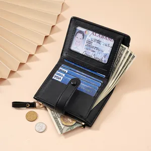 Minimalist black short wallet for women, compact folding card holder with zipper coin pocket.
