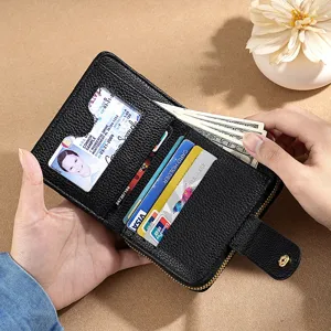 Women's black pebbled leather short wallet with card slots and zip coin pocket.
