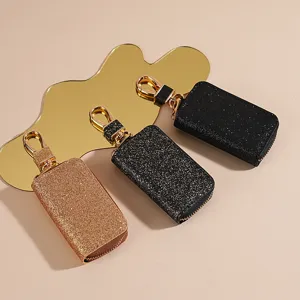 Astuccio per chiavi auto in pelle glitterata con cerniera e gancio dorato per uomo e donna