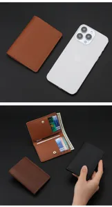 Detailed view of minimalist soft leather folding card wallet showing interior card slots and buttons.
