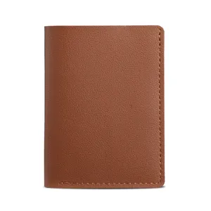 Minimalist brown leather card holder, stylish compact folding wallet for daily use.